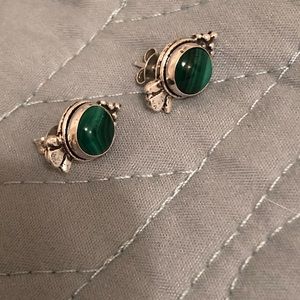 Sterling silver malachite studs.